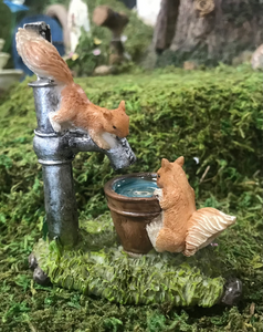 Fairy Garden Squirrels playing on a Pump Well
